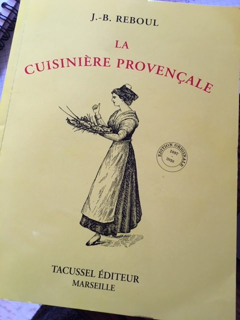 Couverture du livre la cuisinière provencale : jaune, avec l'image d'une gravure de femme